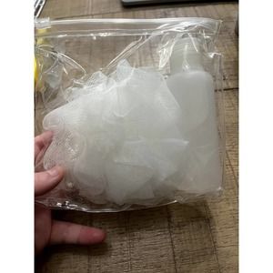 Travel Bottle And White Bath Pouf Set